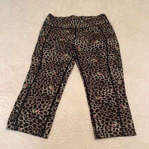 Betsey Johnson size medium spandex capris cheetah print with roses